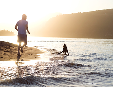 Man running with his dog